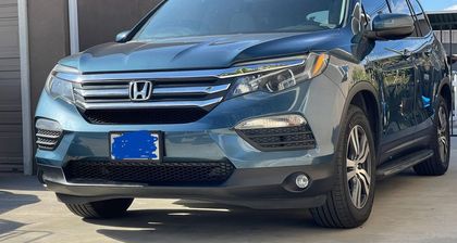 Ceramic coated SUV showing even gloss across the bonnet and side panels