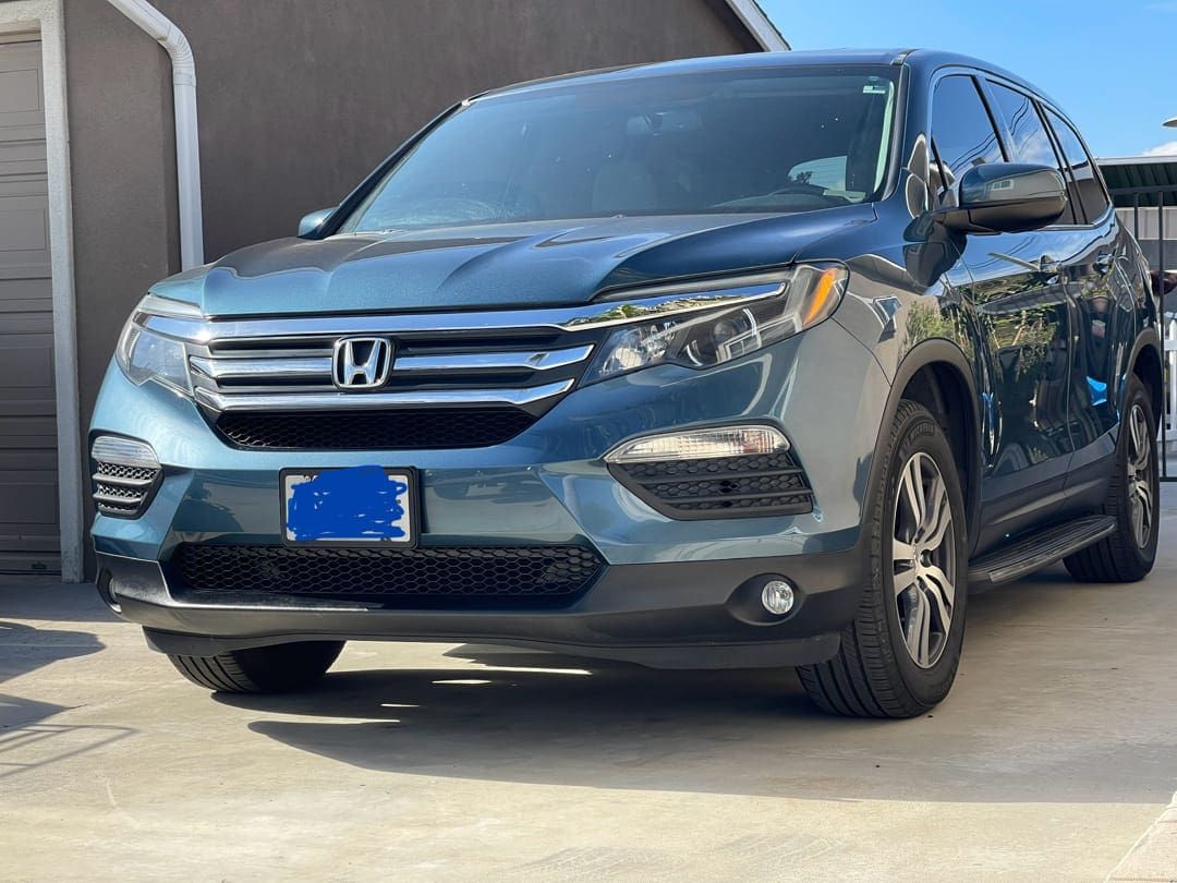 Honda Pilot SUV with professional ceramic coating showing clean, glossy finish