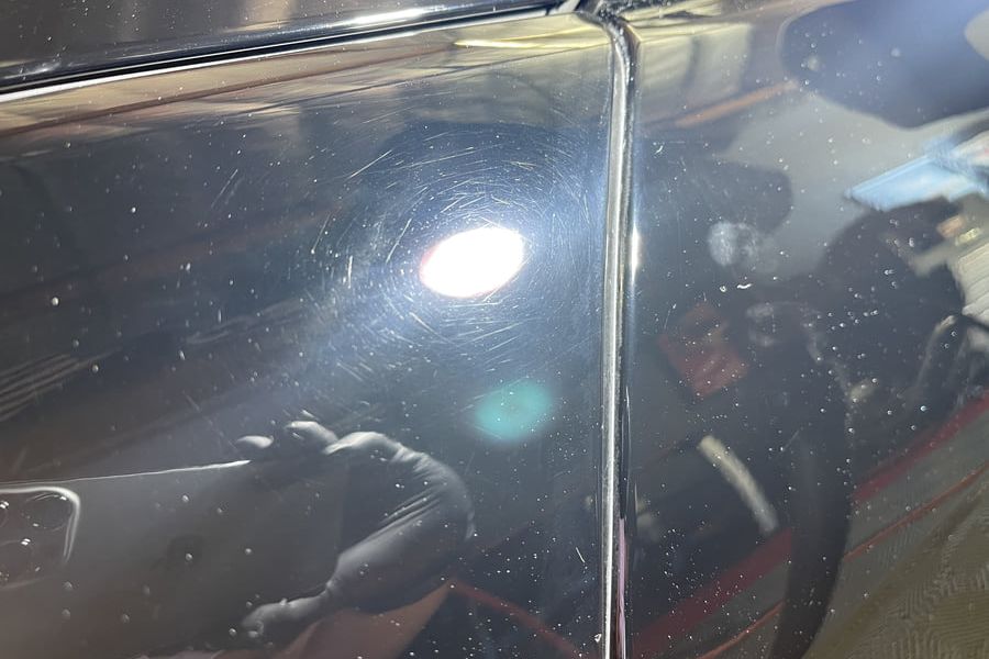 Mercedes SL550 paintwork before correction, showing scratching and swirl marks
