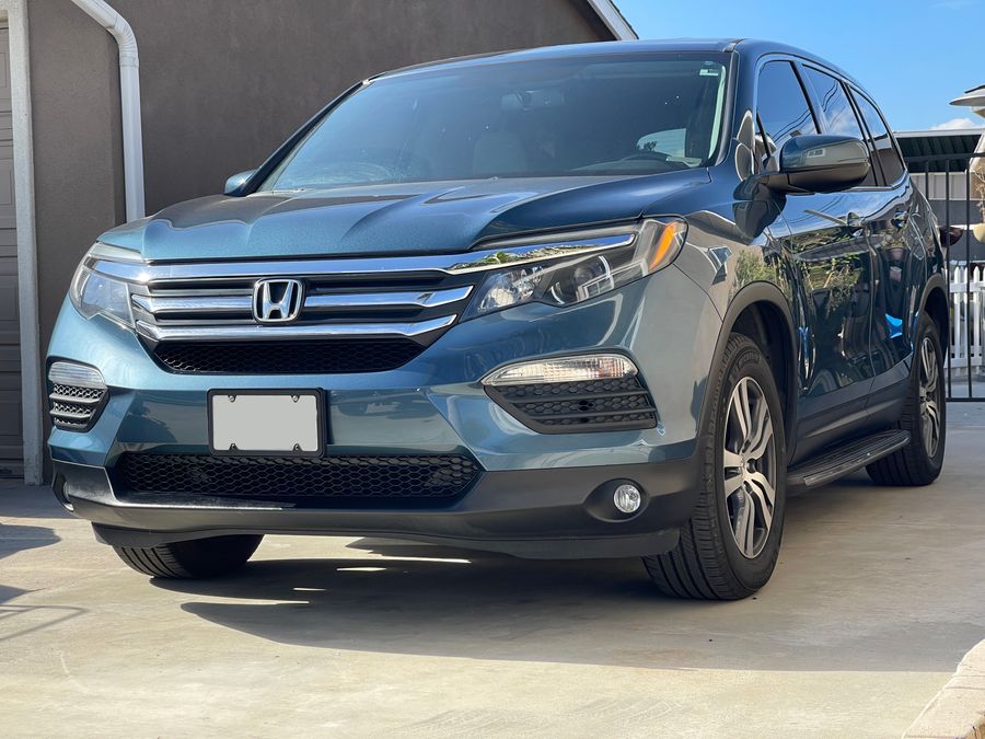 Professional ceramic coating provides superior protection for new car paint