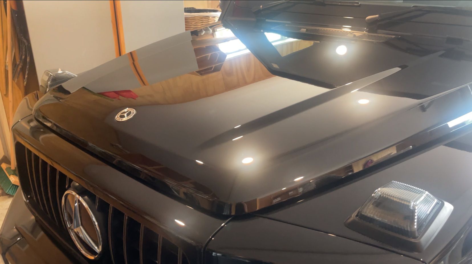 Polished and ceramic coated vehicle bonnet showing deep gloss and paint clarity