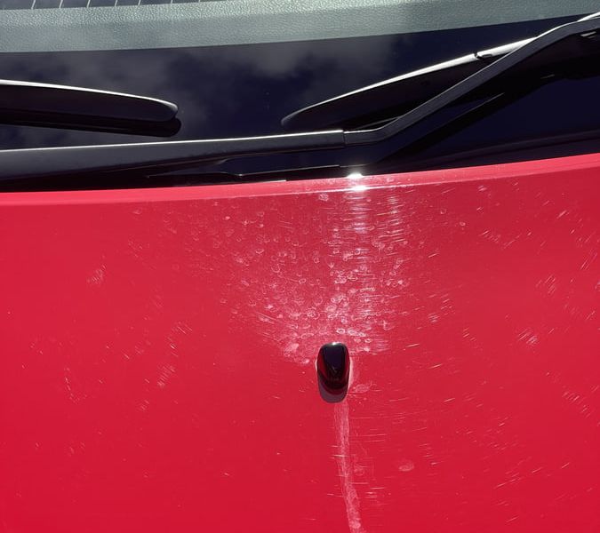 Mineral deposits left on paintwork where water droplets have dried in place