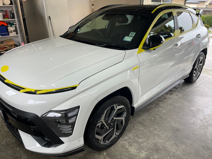 Newly ceramic coated white vehicle showing enhanced gloss and protection